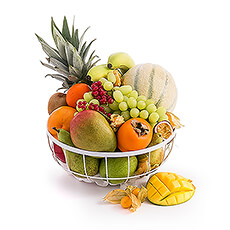 Fruits exotiques dans une corbeille en métal blanc