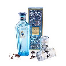 Laat je meeslepen door het succes van Gin & Tonic met dit luxueuze geschenk met Star of Bombay London Dry Gin, Qyuzu Premium Tonic en een set botanicals.