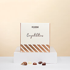 De beste manier om iemand proficiat te wensen, is met een zoete verrassing. Deze Congratulations Discovery box van de Belgische Meesterchocolatier Neuhaus is het ideale geschenk voor elke chocoladeliefhebber.
