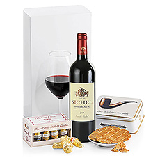 Montrez-lui comment le vin se déguste et combinez le tout avec les cookies de luxe Destrooper et les pralines au vin « Château Carré » pour offrir à votre papa une Fête des Pères inoubliable.