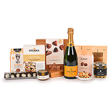 Dit is één van onze meest exclusieve geschenken: de Ultimate Gourmet met de legendarische Veuve Clicquot Brut Champagne. De uitstekende champagne wordt gecombineerd met een zorgvuldig samengestelde selectie van de fijnste Europese gastronomische specialiteiten en luxe Belgische pralines.