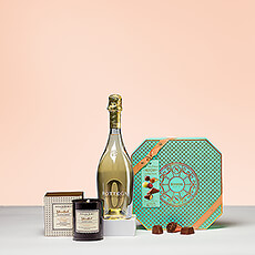 Een geschenkmand met een heerlijk ruikende geurkaars, een fles lekkere alcoholvrije bubbels en smakelijke Belgische pralines is het ideale cadeau voor elke levensgenieter.