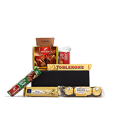 Een cadeau om een chocoholic te verrassen? Zoek niet verder, deze geschenkdoos is het perfecte kleine cadeau om elke chocoladeliefhebber te plezieren! Côte d'Or Bouchées, Ferrero Rochers, Toblerone en nog zoveel meer .
