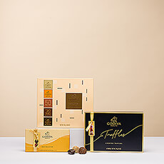 Wie houdt er niet van een toren van luxe Belgische chocolade? Onze prachtige Godiva chocolade cadeautoren is een favoriet van alle chocoladeliefhebbers. Het is een perfect chocoladegeschenk voor vrienden, familie en zakenrelaties.