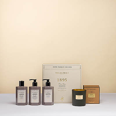 Un coffret cadeau pour se faire plaisir avec la marque de luxe Atelier Rebul. Une belle boîte contenant un savon pour les mains, un gel douche et une lotion pour les mains et le corps, ainsi qu'une bougie parfumée à l'odeur divine de la marque de luxe française.