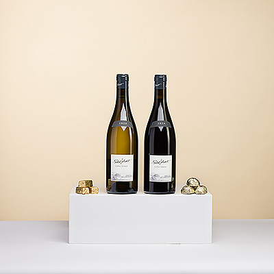 Le meilleur cadeau pour remercier ou témoigner sa reconnaissance à une personne chère consiste en une paire de remarquables vins de Sancerre de Pascal Jolivet, qui respirent la qualité, le goût et le talent. Et une petite touche finale en or avec les chocolats belges Corné Port Royal pour compléter ce petit cadeau d'hospitalité.