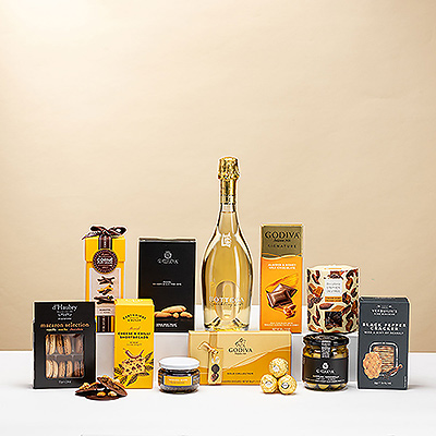 Pour un cadeau qui associe de grandes marques à une abondance de saveurs riches, l'Ultimate Gourmet est le choix idéal. Vos amis, votre famille et vos collègues apprécieront chaque instant de ce somptueux coffret, grâce à la généreuse collection de délicieux en-cas associés au vin mousseux Bottega Zero sans alcool.