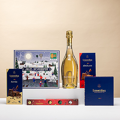Un cadeau de Noël élégant et sans alcool : vin mousseux pétillant, chocolats Leonidas et biscuits Jules Destrooper. Gourmandise festive!