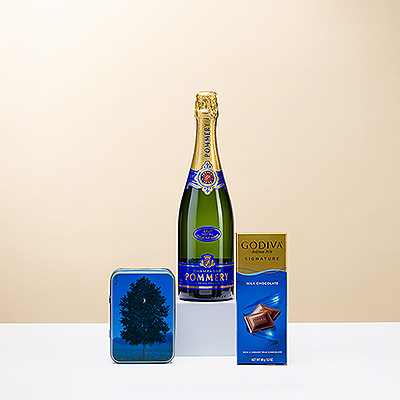 Quoi de plus délicieux qu'un champagne à bulles dégusté avec du chocolat et des biscuits? L'association de l'élégant champagne Pommery avec une tablette de chocolat au lait Godiva Signature et une mini-boîte Jules Destrooper contenant de délicieuses chips au beurre ne manquera pas de plaire.