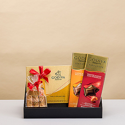 Un cadeau élégant pour ceux qui ont un goût irréprochable: un plateau de chocolats luxueux de Godiva. Un merveilleux cadeau pour les anniversaires, les remerciements et les fêtes. Ce cadeau au chocolat Godiva est également un cadeau d'entreprise très apprécié.