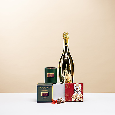 Célébrez Noël avec ce trio exclusif composé de Bottega Gold Prosecco Spumante, de six chocolats de Noël Neuhaus et d'une luxueuse bougie parfumée Atelier Rebul Pomme et Cannelle.