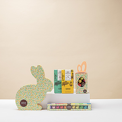 Rendez la fête de Pâques pétillante avec ce panier classique de Corné-Port-Royal rempli de délicieux chocolats ! Une abondance de délices de Pâques au chocolat belge est enveloppée à la main dans un panier blanc pour un merveilleux cadeau de Pâques.