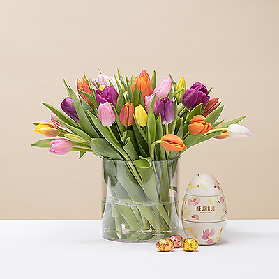 Faites entrer le printemps dans votre maison avec un bouquet coloré de tulipes hollandaises et un œuf de Pâques en métal de Neuhaus.
