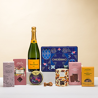Notre best-seller Sweet Tooth Deluxe s'accompagne d'une bouteille de champagne Veuve Clicquot ! Nous avons sélectionné la meilleure gamme de friandises européennes, y compris plusieurs de nos marques belges préférées.