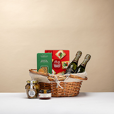 Savourez la magie de Noël avec le coffret Christmas Picknick : cava, biscuits croustillants, dip gourmand et olives dans un joli panier en osier.
