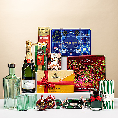 Offrez un coffret de Noël luxueux avec champagne, chocolats et gourmandises. Le cadeau parfait pour une fête élégante et inoubliable.