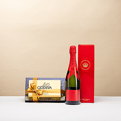Coffret festif luxueux avec la Moët & Chandon Brut Impérial en édition limitée et la Godiva Holiday Jingle Tower . Le cadeau parfait mêlant Champagne et chocolats belges pour sublimer les fêtes.