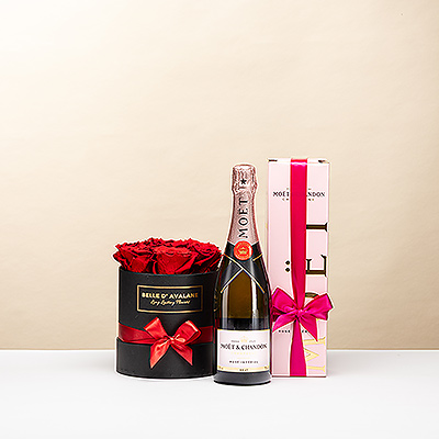 Célébrez l&#39;amour avec le luxe ultime. Ce coffret noir exclusif associe de magnifiques roses rouges stabilisées à une bouteille de l&#39;iconique champagne Moët & Chandon Rosé Impérial. Un cadeau prestigieux qui garantit une émotion inoubliable et un effet "wow".