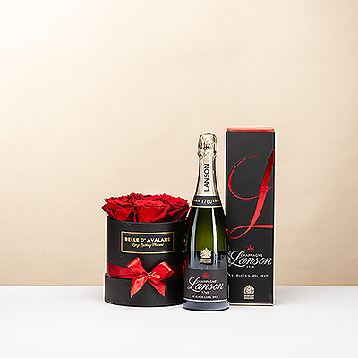 Un geste intemporel tout en distinction. Ce coffret noir luxueux associe de magnifiques roses rouges stabilisées au raffinement du champagne Lanson Le Black Brut. Un cadeau élégant et durable pour transformer chaque occasion en un moment d'exception.