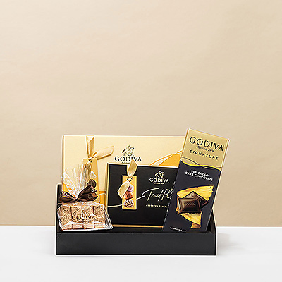 Le plateau cadeau noir et or est l'un de nos cadeaux les plus sophistiqués et les plus élégants.